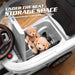 Open under-seat storage in a white Ford F-150 Raptor kids' ride-on push car, holding small toys and plush animals.