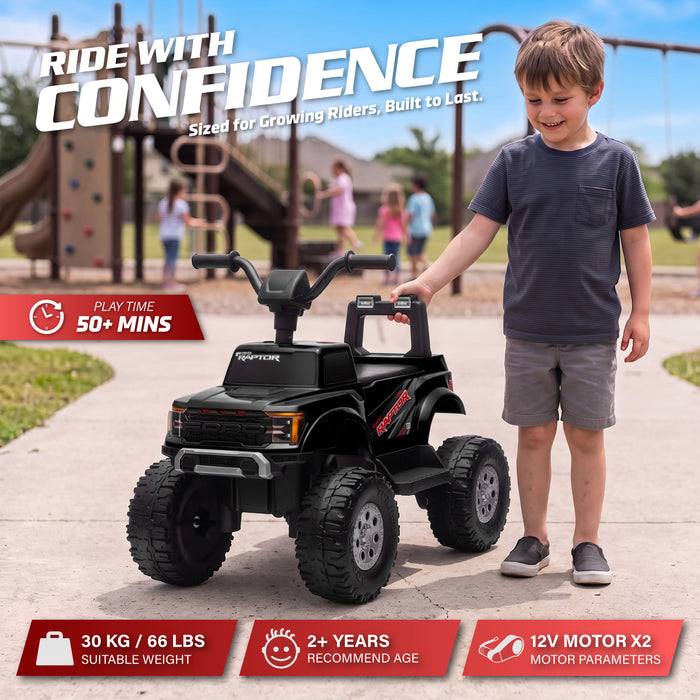 Child standing beside a black Ford F-150 Raptor 12V kids' ride-on ATV to show the vehicle's size and proportions.