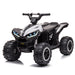 White 12V battery-powered kids ATV with black body accents, a single seat, treaded wheels and front headlights.