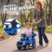 Parent pushing a child in a blue Ford F-150 Raptor ride-on push car outdoors using the rear parent handle.