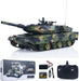 Camouflage toy tank with remote control and accessories on a white background