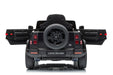 Rear view of black Land Rover Defender 110 kids ride-on car