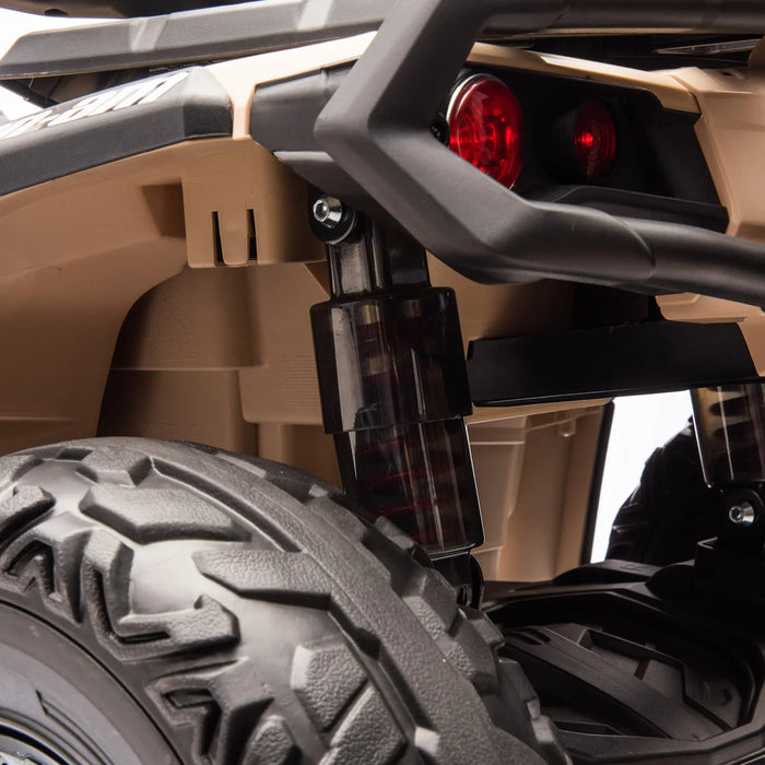 Close-up of Can-Am Outlander 24V kids ATV off-road tires and black wheels