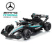 A Mercedes-AMG Petronas Formula 1 team toy car in a black and teal livery, shown on a clean white background with the Mercedes star logo and 'AMG PETRONAS FORMULA 1 TEAM' branding in the top left corner.