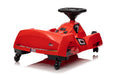 6V ride-on drifting gently on a flat outdoor surface for controlled spins.